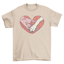 Animal paw and human hand in heart t-shirt