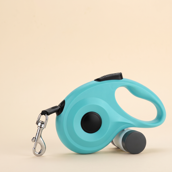 retractable pet leash with built-in poop bag holder — studio product photo